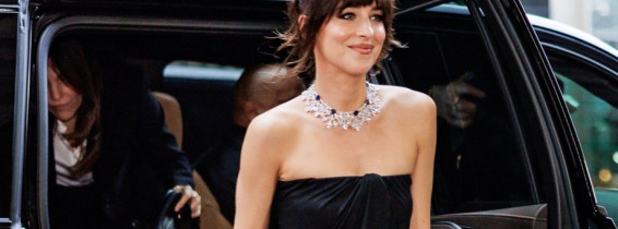 Dakota Johnson exudes elegance in a black Ferragamo dress at the Global Ambassadorship Celebration in NYC