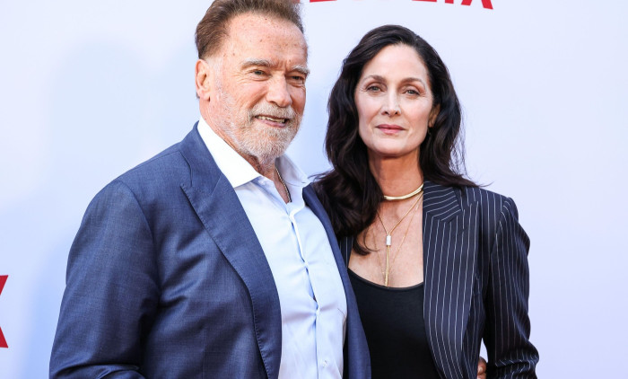 HOLLYWOOD, LOS ANGELES, CALIFORNIA, USA - JUNE 11: Austrian and American actor, former Governor of California, businessman, former politician, and former professional bodybuilder Arnold Schwarzenegger and Canadian-American actress and producer Carrie-Anne