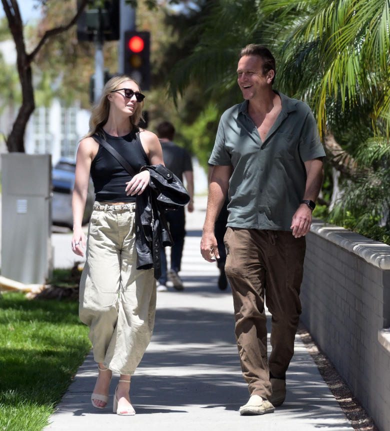 EXCLUSIVE: Newly engaged couple Jason Segel and Kayla Radomski are all smiles as they head to lunch in Beverly Hills