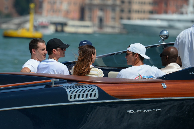 Orlando Bloom all smiles on Venice water taxi with Corey Gamble and Tom Brady during Bezos wedding celebrations