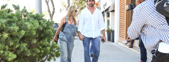 Denise Richards and her husband Aaron Phypers go on cute stroll through BH