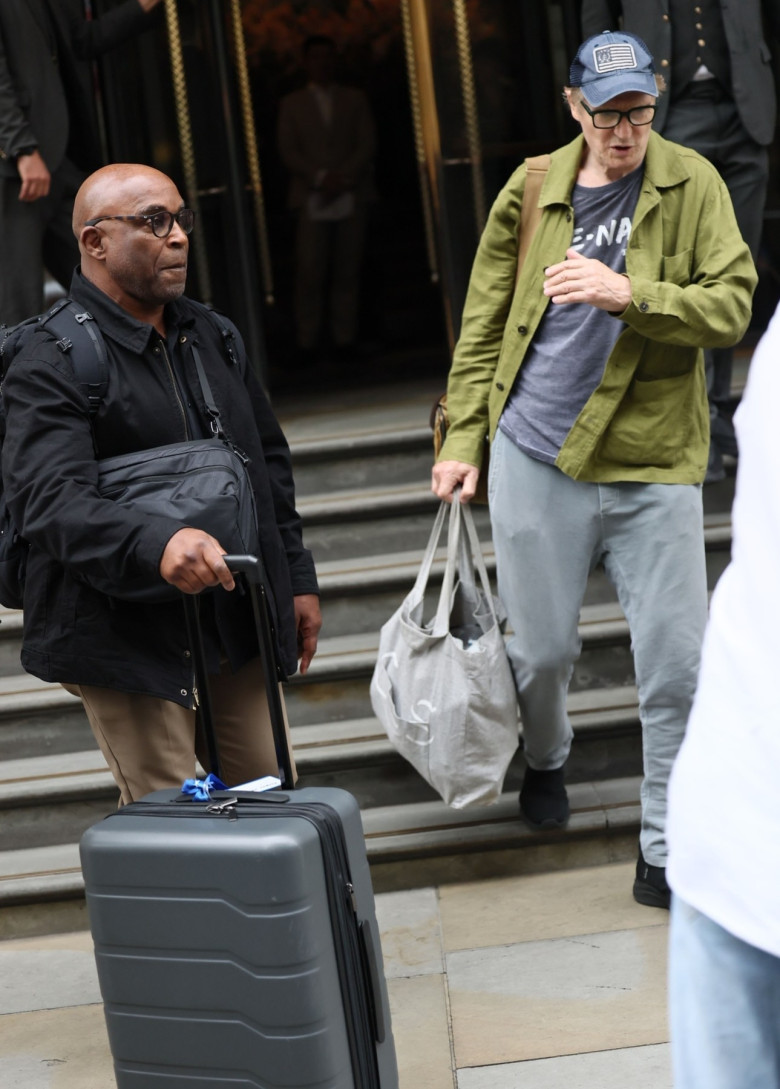 After recently causing a media frenzy, Pamela Anderson and Liam Neeson leave a London hotel.