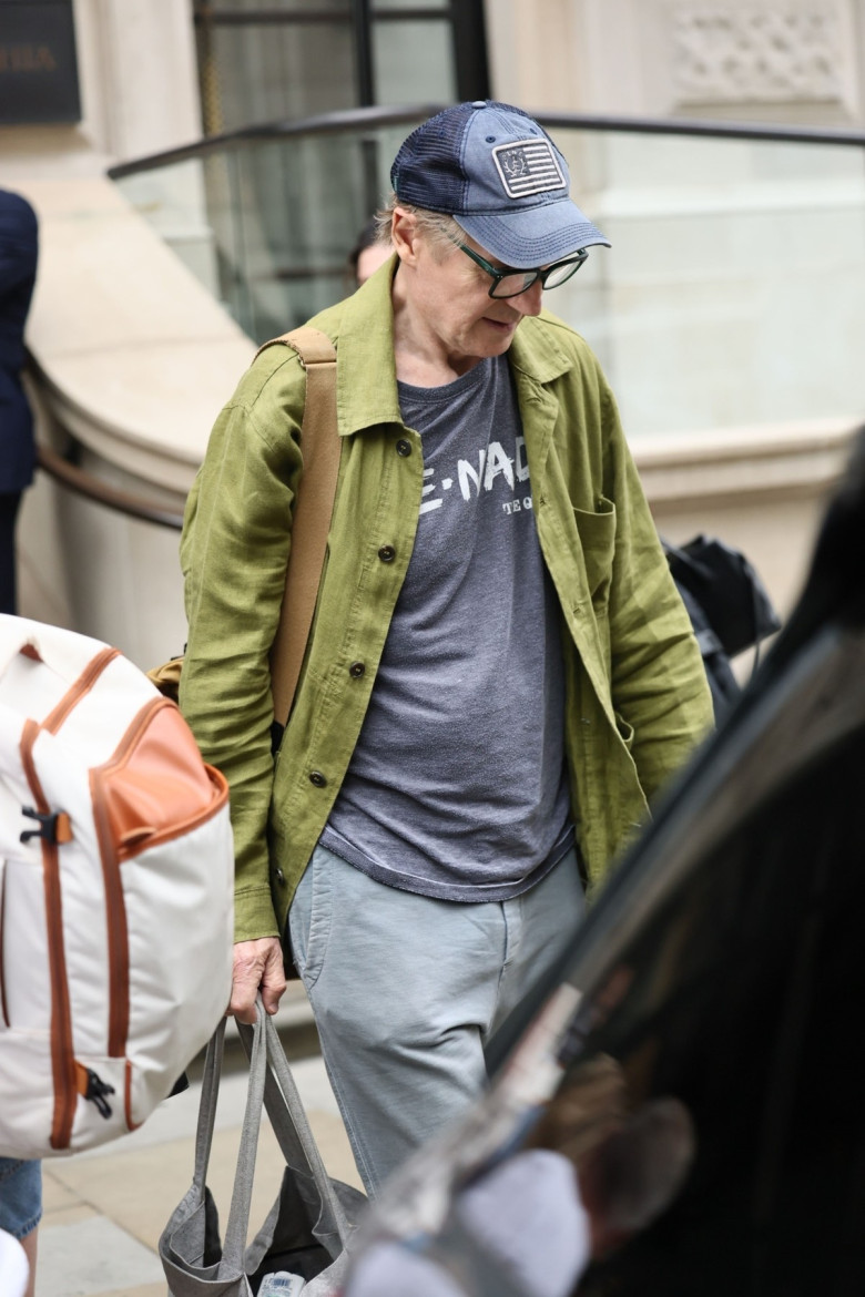 After recently causing a media frenzy, Pamela Anderson and Liam Neeson leave a London hotel.
