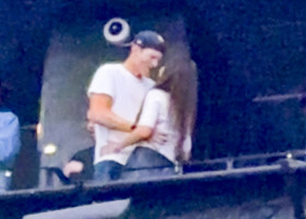 Ashton Kutcher and Mila Kunis at the Backstreet Boys concert