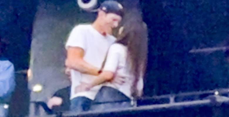 Ashton Kutcher and Mila Kunis at the Backstreet Boys concert