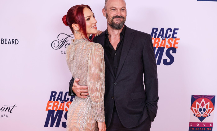 CENTURY CITY, LOS ANGELES, CALIFORNIA, USA - MAY 16: Sharna Burgess and fiancé Brian Austin Green arrive at the 32nd Annual Race To Erase MS Gala 2025 held at the Fairmont Century Plaza on May 16, 2025 in Century City, Los Angeles, California, United Stat