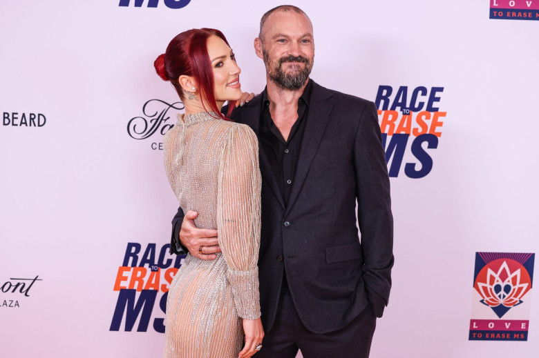 CENTURY CITY, LOS ANGELES, CALIFORNIA, USA - MAY 16: Sharna Burgess and fiancé Brian Austin Green arrive at the 32nd Annual Race To Erase MS Gala 2025 held at the Fairmont Century Plaza on May 16, 2025 in Century City, Los Angeles, California, United Stat