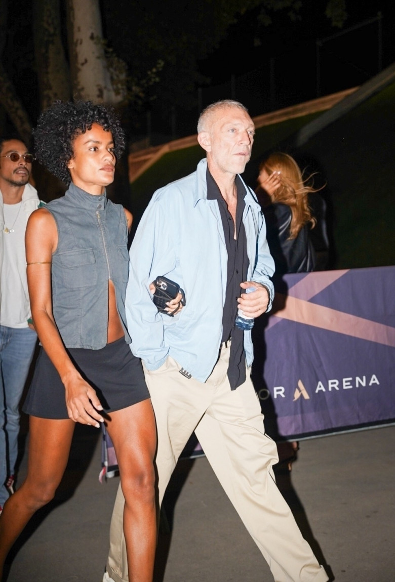 Vincent Cassel and his wife Narah Baptista arrive for Drake's concert