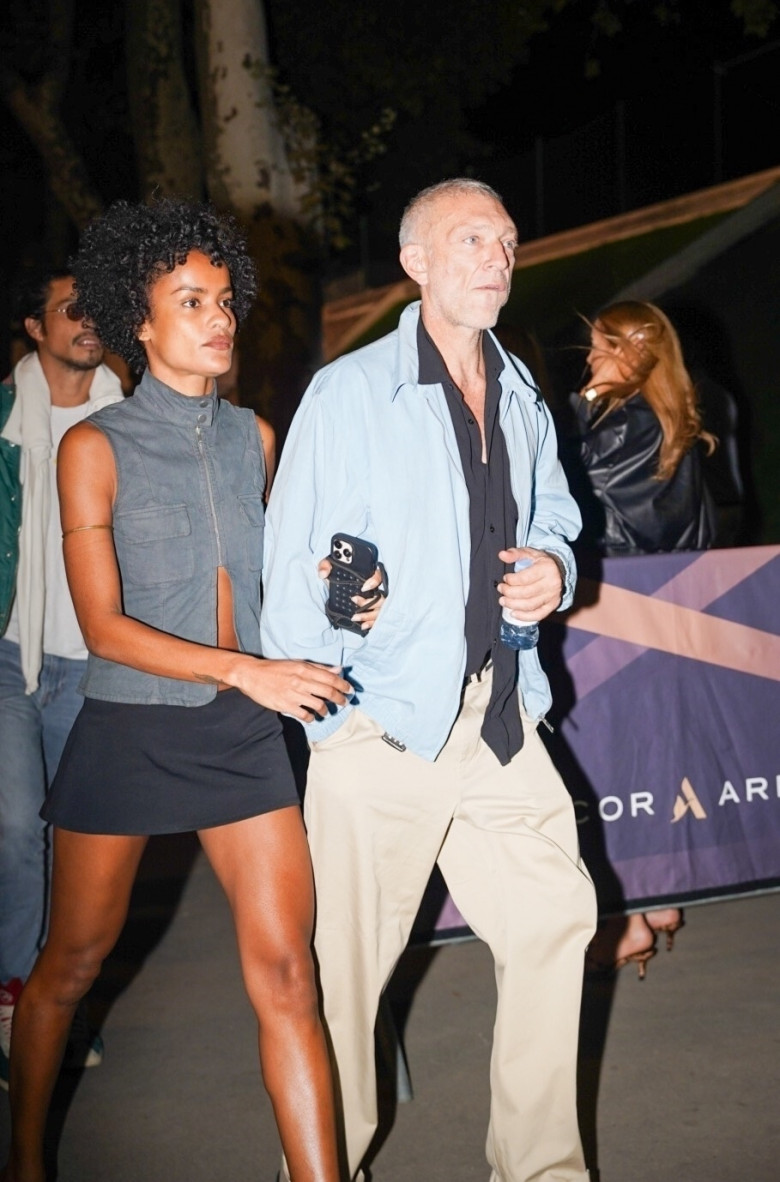 Vincent Cassel and his wife Narah Baptista arrive for Drake's concert