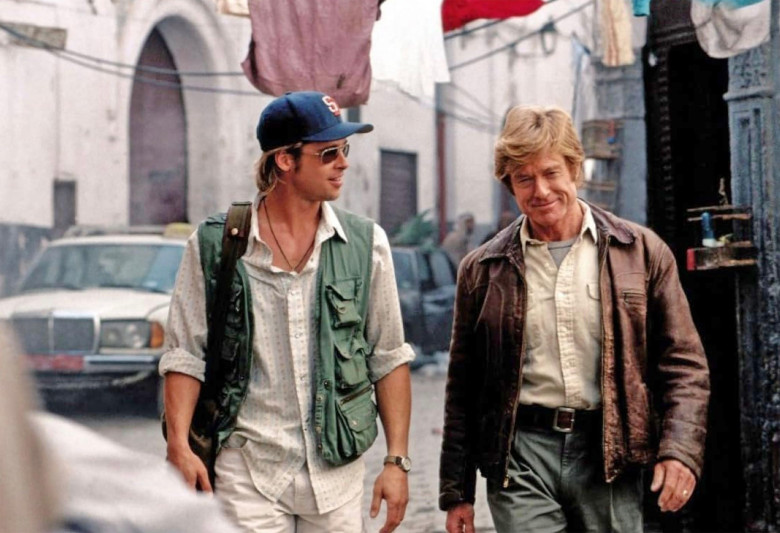 THE SPY GAME 2001 Universal Pictures film with Robert Redford at right and Brad Pitt.