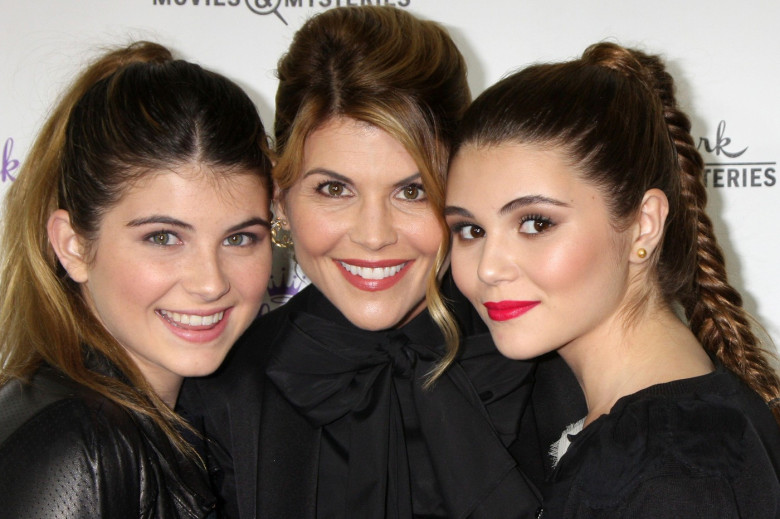 ***FILE PHOTO*** Lori Loughlin and husband, Mossimo Giannulli, will plead guilty to conspiracy charges in connection with securing fraudulent admission of their two daughters. LOS ANGELES, CA - NOVEMBER 4: Lori Loughlin, Isabella Rose Giannulli, Olivia Ja