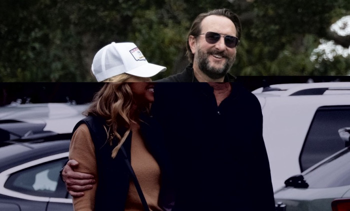 EXCLUSIVE: ** NO DAILY MAIL ON LINE ** Christine Baumgartner flashes her engagement ring during an outing with Josh Connor.