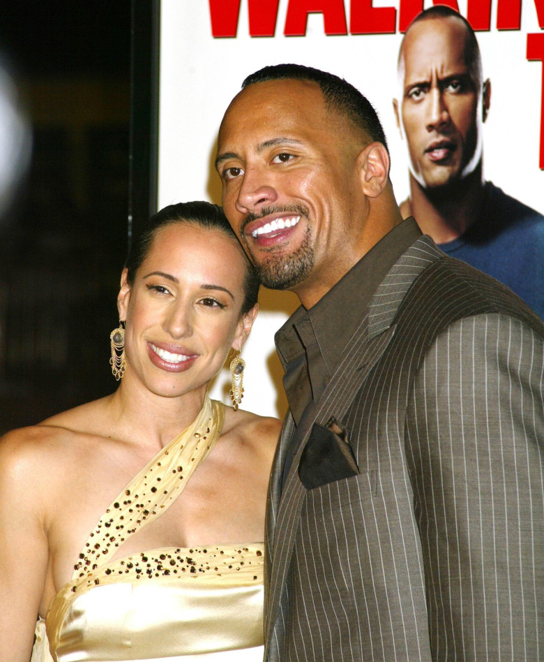 Dwayne "The Rock" Johnson and his wife, Dany Garcia Johnson at the premiere of  "Walking Tall"  in Hollywood, California on Monday March 29,  2004.  Photo credit: Francis Specker