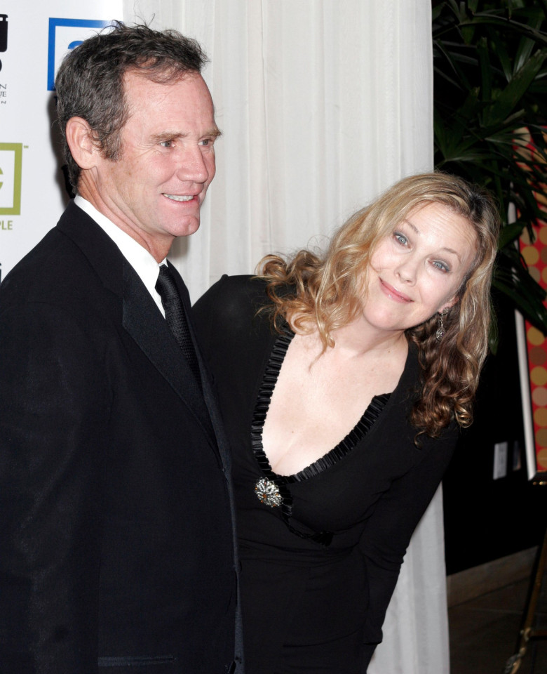 Catherine O'Hara and her husband, Bo Welch, arrives at the 19th Annual American Cinematheque Award honoring actor Steve Martin in Beverly Hills, CA on November 12, 2004. Photo by Francis Specker