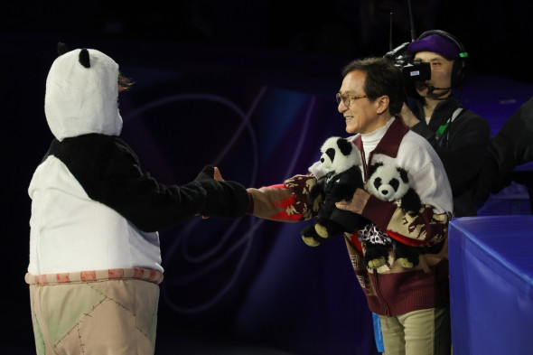 Jackie Chan appears at figure skating gala during Milan Winter Olympics
