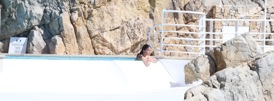 Michelle Rodriguez takes in the French sunshine as she relaxes by the pool at the Cap Eden Roc hotel during 79th Cannes Film Festival.
