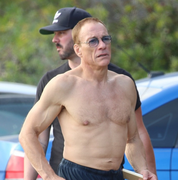 *EXCLUSIVE* A shirtless Jean-Claude Van Damme enjoys a funny-looking cigarette with friends in Malibu!