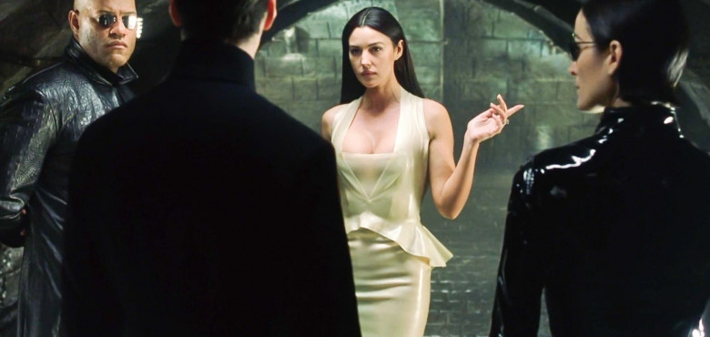 USA. Keanu Reeves and Monica Bellucci  in a scene from the ©Warner Bros film : The Matrix Reloaded (2003).Plot: Neo and his allies race against time before the machines discover the city of Zion and destroy it. While seeking the truth about the Matrix, N