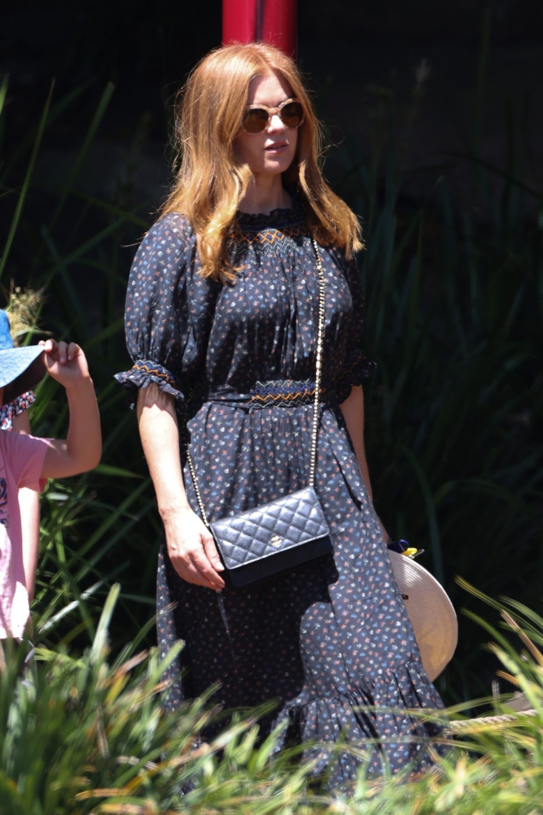 Isla Fisher and kids are pictured at a playground in Sydney.