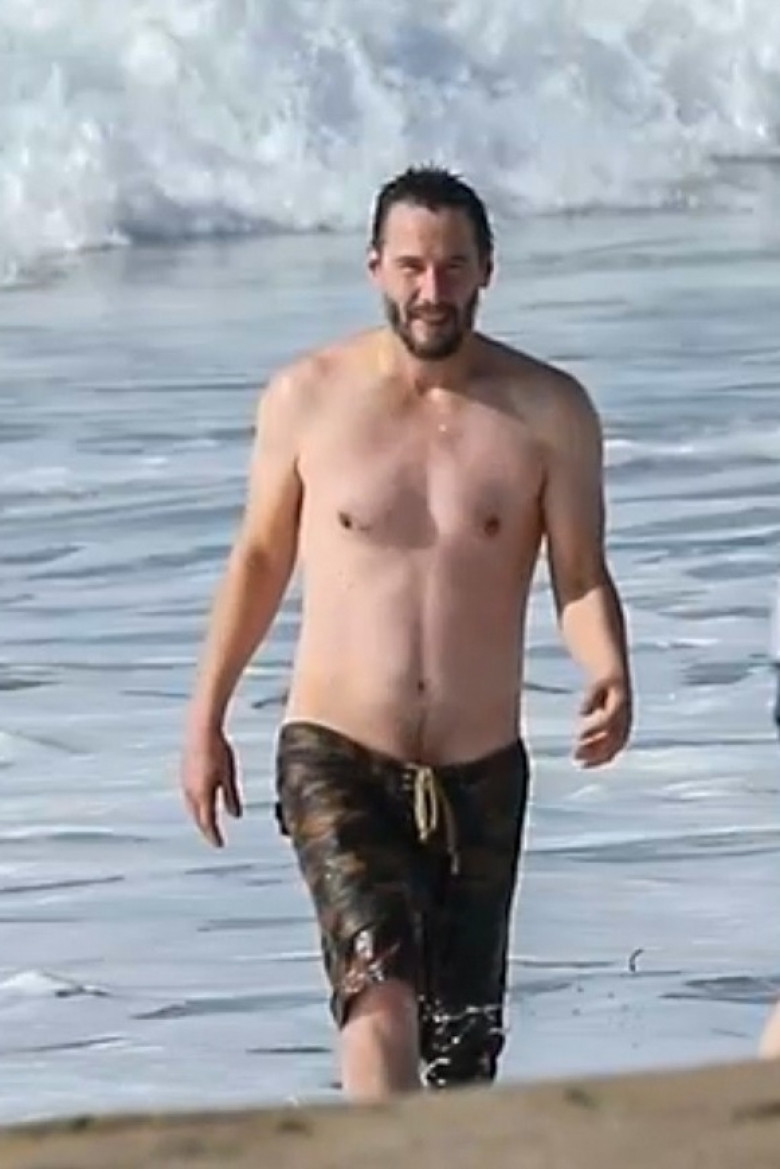 *EXCLUSIVE* Keanu Reeves shows off his very fit bod at 56 as he goes for a swim in Malibu **WEB EMBARGO UNTIL 12:15 PST on January 6, 2021**