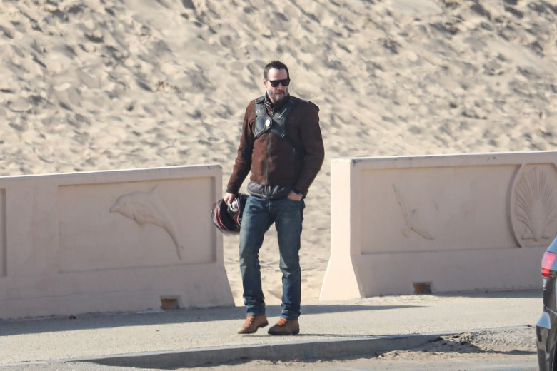 *EXCLUSIVE* Keanu Reeves shows off his very fit bod at 56 as he goes for a swim in Malibu **WEB EMBARGO UNTIL 12:15 PST on January 6, 2021**