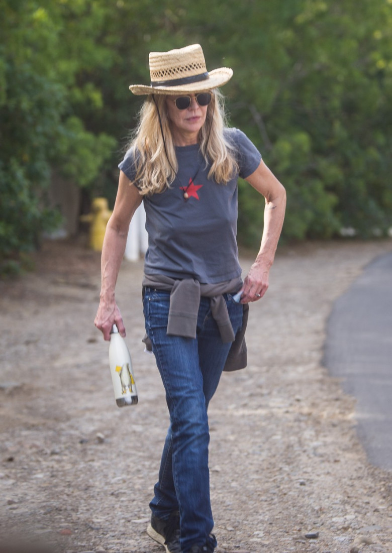 EXCLUSIVE: Meg Ryan gets some exercise on an afternoon hike