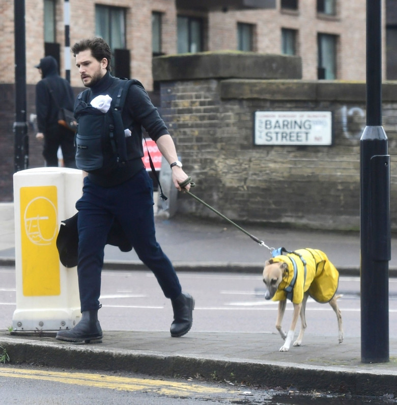 *EXCLUSIVE* Game Of Thrones' British Actor Kit Harington takes his newborn baby boy out for a walk in London.
