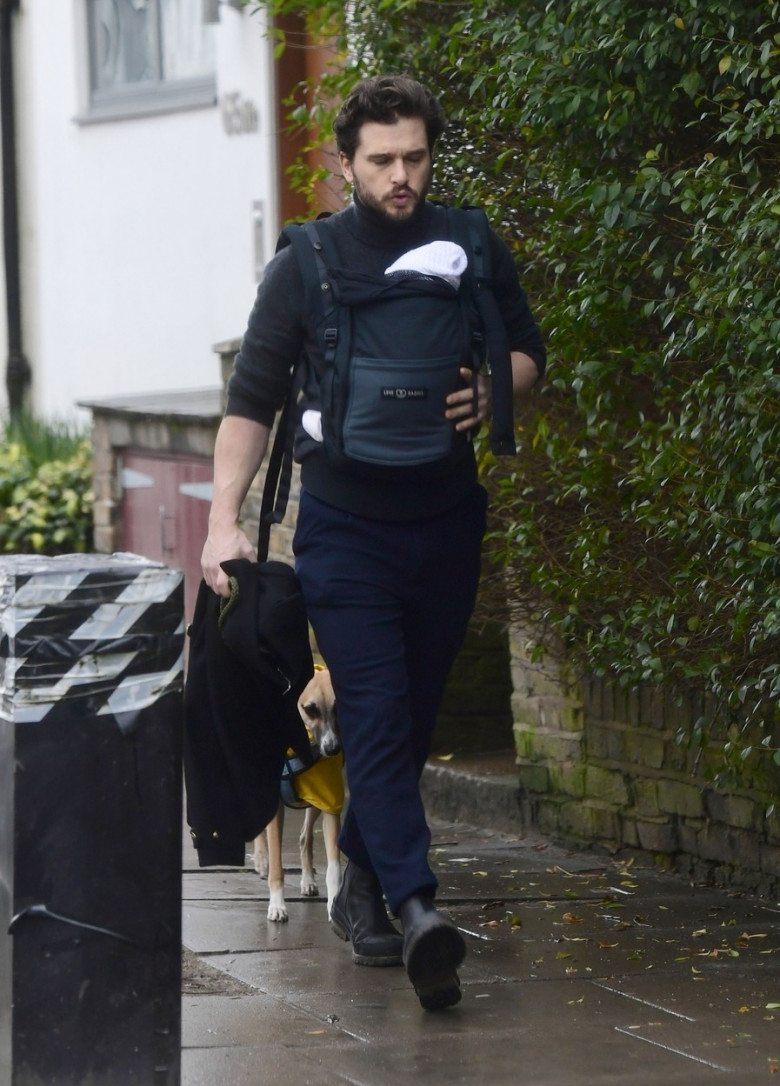 *EXCLUSIVE* Game Of Thrones' British Actor Kit Harington takes his newborn baby boy out for a walk in London.
