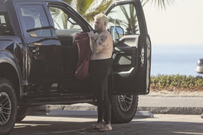 *EXCLUSIVE* Jonah Hill shows off his tattoed surfer body after a surfing session on a windy California morning!