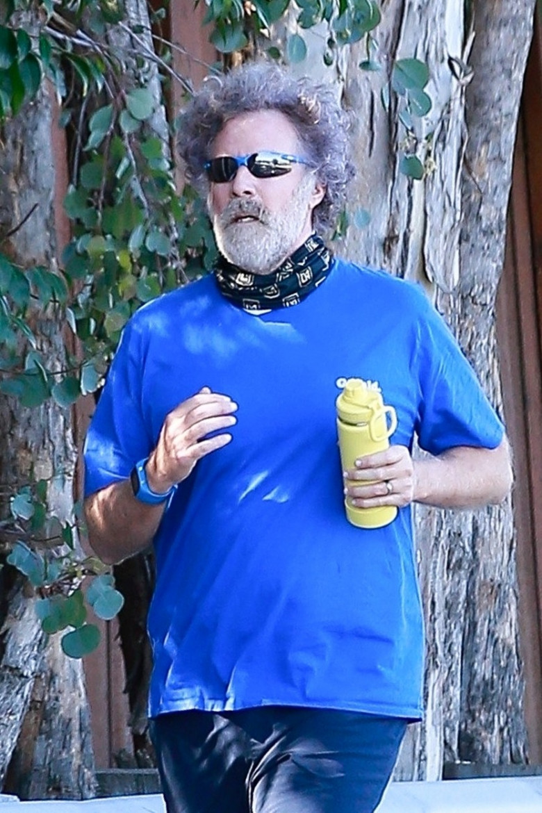 *EXCLUSIVE* Will Ferrell sports a very shaggy look as he goes for a run around his neighborhood