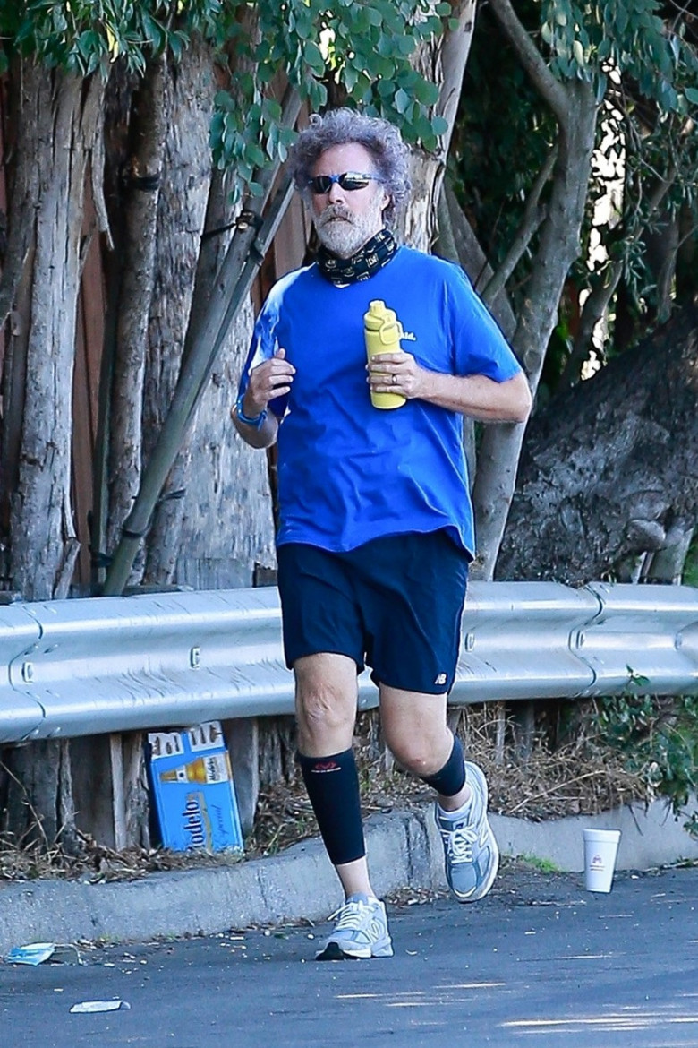 *EXCLUSIVE* Will Ferrell sports a very shaggy look as he goes for a run around his neighborhood