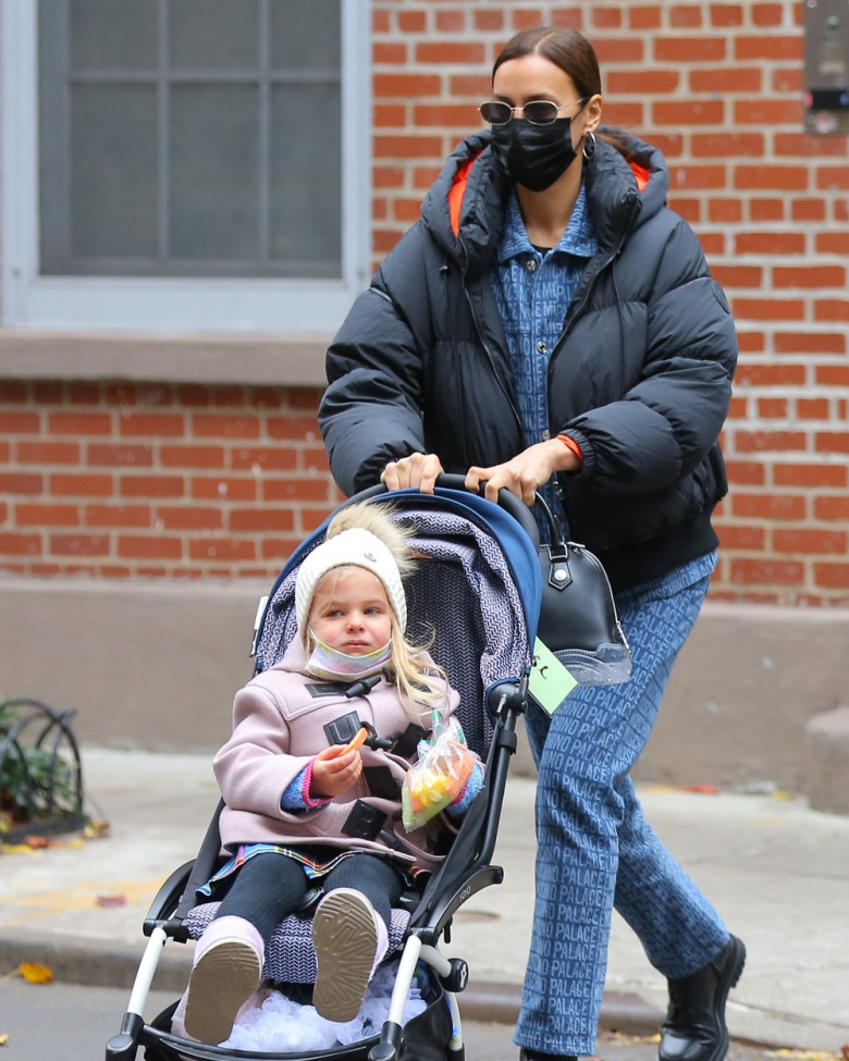Russian model Irina Shayk and her daughter Lea Cooper walk home in West Village in New York City