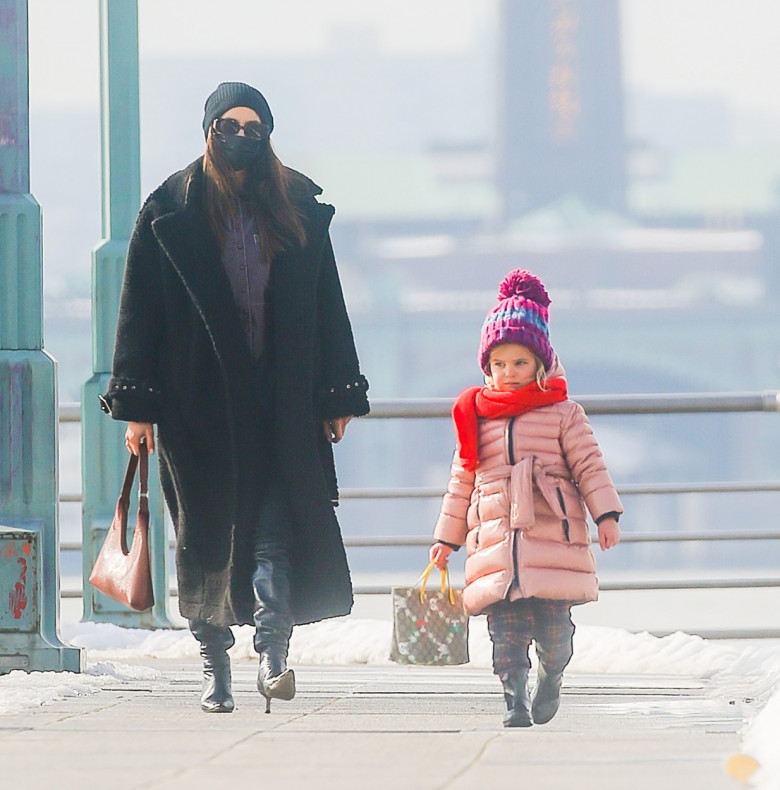 Irina Shayk and her daughter Lea De Seine Shayk Cooper are seen having a laugh while they sitting by the Hudson River in New York City
