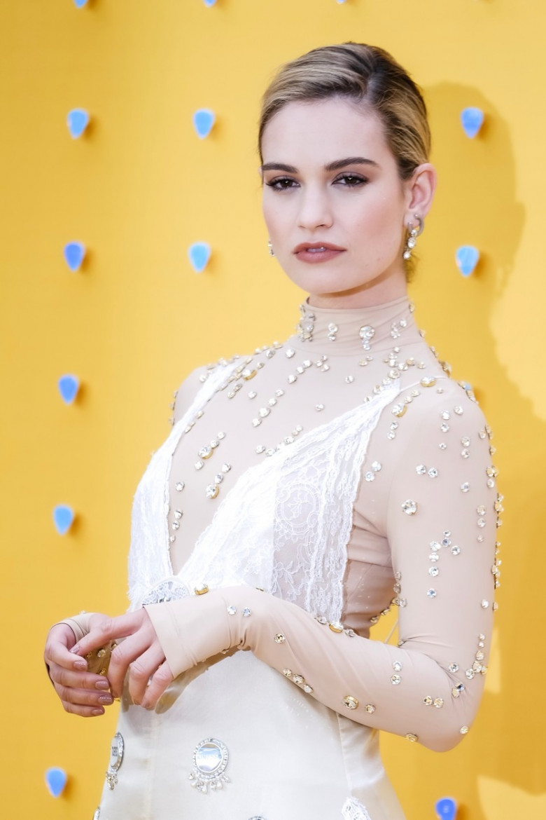 Lily James poses on the red carpet for the UK premiere of YESTERDAY
