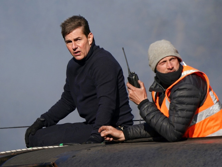 *PREMIUM-EXCLUSIVE* MUST CALL FOR PRICING BEFORE USAGE - TOM TO THE RESCUE!!!! Action man Tom Cruise grabs cameraman and stops him from falling off train while filming MI7,Living up to his All Action Hero Status, The American Actor Tom Cruise shoots a