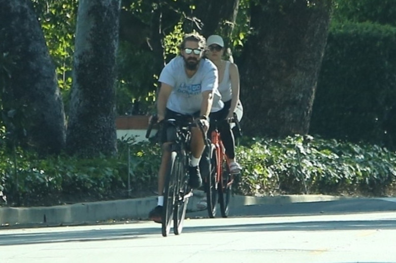 *EXCLUSIVE* Back Together?! Shia LaBeouf and Mia Goth go on a bicycle ride together
