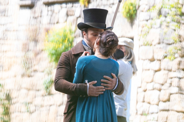 EXCLUSIVE: Dakota Johnson And Cosmo Jarvis Share A Passionate Kiss As They Film Netflix's Adaptation Of Jane Austen's Persuasion In Bath