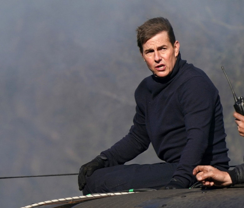 *PREMIUM-EXCLUSIVE* MUST CALL FOR PRICING BEFORE USAGE - TOM TO THE RESCUE!!!! Action man Tom Cruise grabs cameraman and stops him from falling off train while filming MI7,Living up to his All Action Hero Status, The American Actor Tom Cruise shoots a