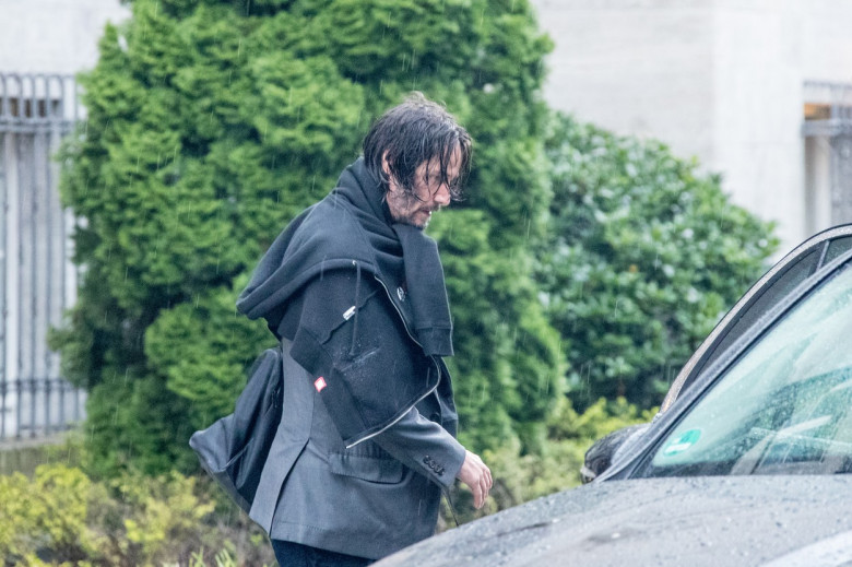 Keanu Reeves leaving his hotel in pouring rain, Berlin, Germany