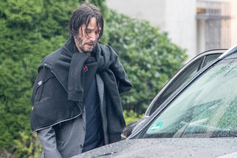 Keanu Reeves leaving his hotel in pouring rain, Berlin, Germany