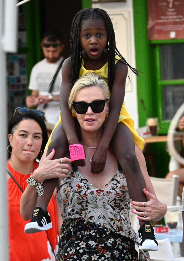 EXCLUSIVE: Charlize Theron Visits Hydra Island With Her Daughters