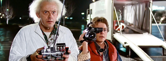 USA. Michael J. Fox and Christopher Lloydin a scene from ©Universal Pictures  film:  Back to the Future (1985).Plot: Marty McFly, a 17-year-old high school student, is accidentally sent thirty years into the past in a time-traveling DeLorean invented by