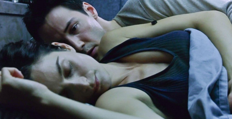 USA. Keanu Reeves and Carrie-Anne Moss in a scene from the ©Warner Bros film : The Matrix Reloaded (2003).Plot: Neo and his allies race against time before the machines discover the city of Zion and destroy it. While seeking the truth about the Matrix, N
