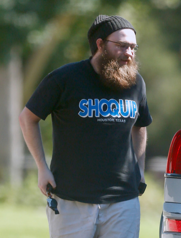 Reclusive former child star Angus T Jones is unrecognizable from his Two and a Half Men days as he strolls around LA barefoot and sporting a thick bushy beard.