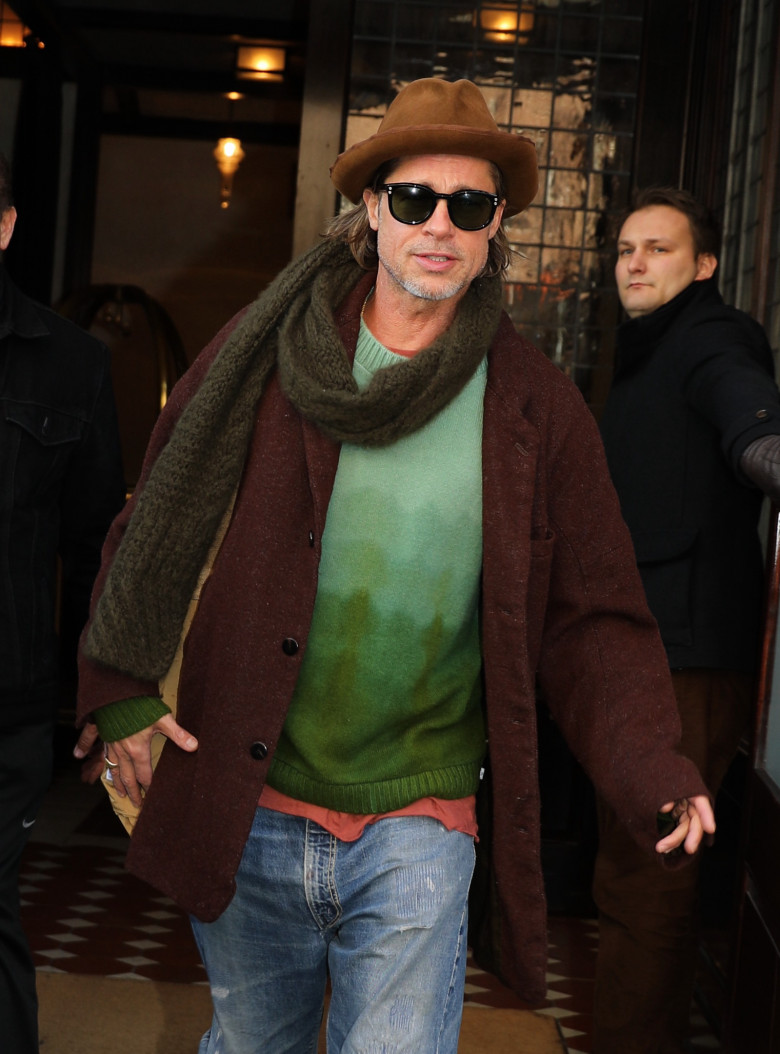 Brad Pitt checks out of his NYC Hotel.