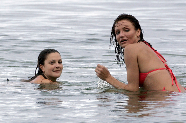Drew Barrymore and Cameron Diaz enjoy a splash in the ocean