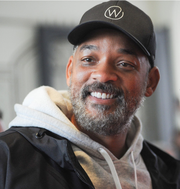 Will Smith leaves his Milan hotel to a hoard of fans during Milan Fashion Week