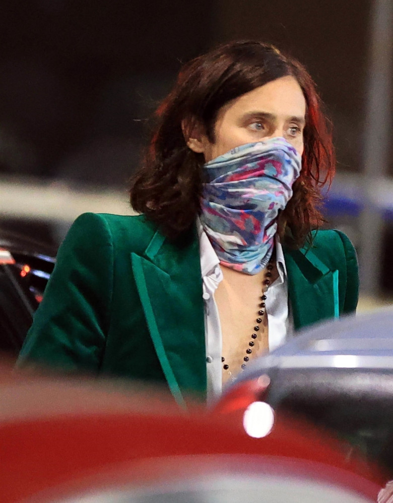 *EXCLUSIVE* WEB MUST CALL FOR PRICING  - The American actor and musician Jared Leto offers some flowers to the Romanian actress and model Madalina Ghenea before going for a dinner together out in Milan.*PICTURES TAKEN ON THE 25/09/2021*