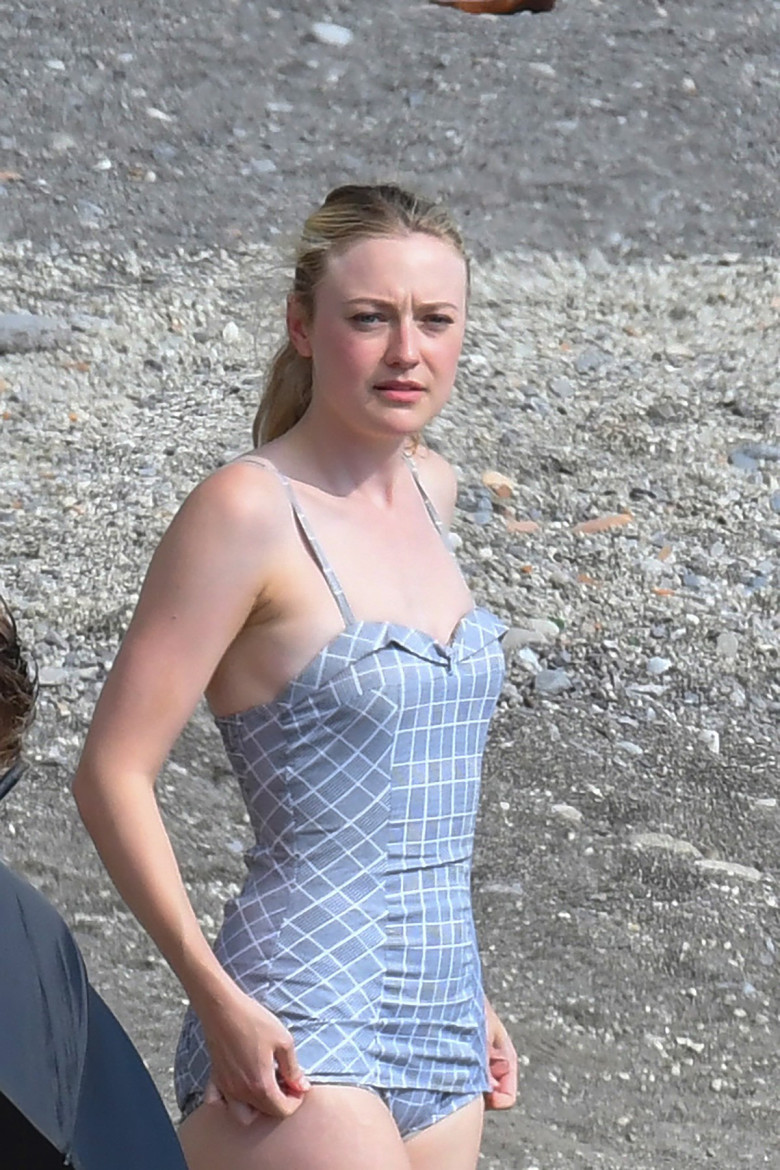 EXCLUSIVE: Dakota Fanning seen in a one-piece swimsuit filming "Ripley" in Strani, Amalfi Coast