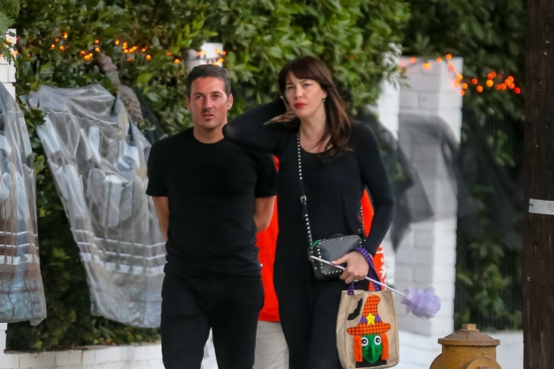 *EXCLUSIVE* Liv Tyler takes her family to a Halloween costume party